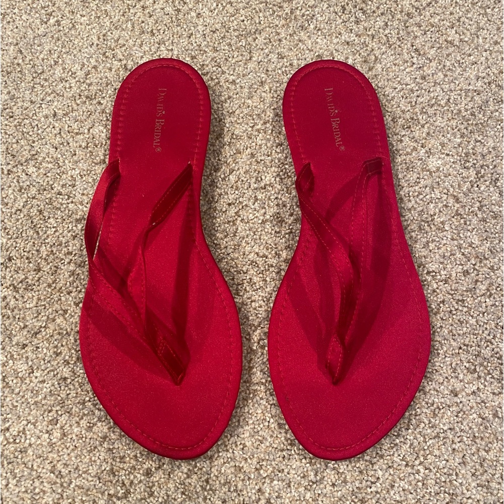 Women’s red satin flip flops